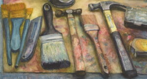 An original object portrait watercolor painting of a toymaker's workbench with brushes, hammers and box cutter.