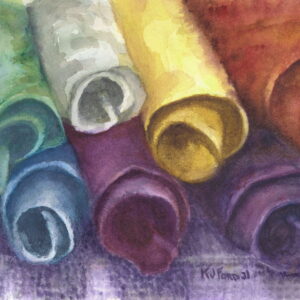 Rolls of felt yarn in a rainbow of colors