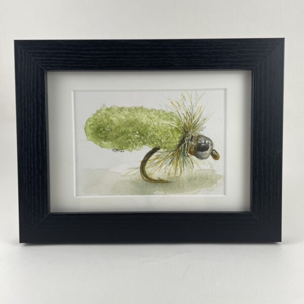 Framed Chartreuse Mop Fly in a black frame.