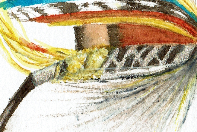 the wrapped hook of a salmon fly