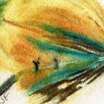 bright yellow orange salmon fly