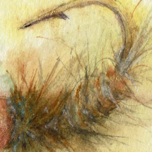 Orange bead head on a fuzzy body nymph